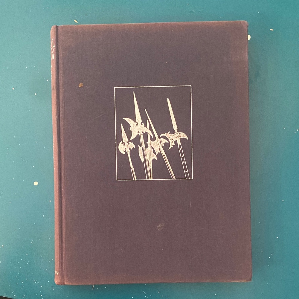 Vintage Purple Hardcover Book with Silver Design